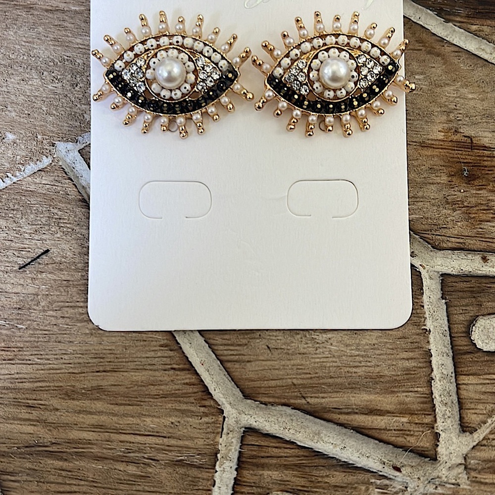 Pearl evil eye earrings in gold